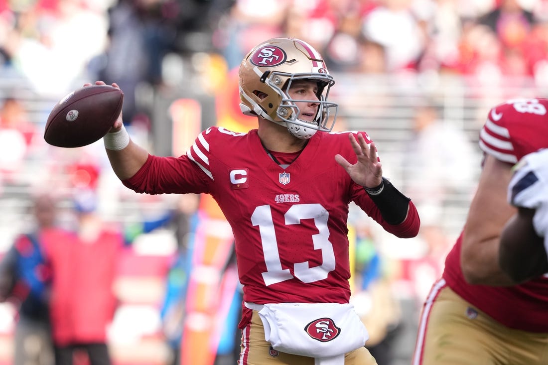 Dec 10, 2023; Santa Clara, California, USA; San Francisco 49ers quarterback Brock Purdy (13) throws a pass against the Seattle Seahawks during the second quarter at Levi's Stadium. Mandatory Credit: Darren Yamashita-USA TODAY Sports