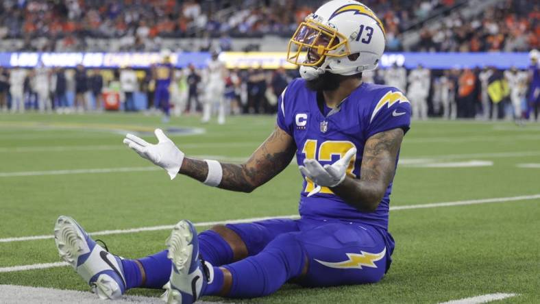 Dec 10, 2023; Inglewood, California, USA; Los Angeles Chargers wide receiver Keenan Allen (13) singles to the referees during the second half in a game against the Denver Broncos at SoFi Stadium. Mandatory Credit: Yannick Peterhans-USA TODAY Sports