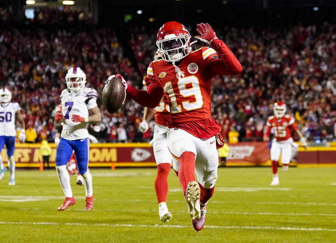 Dec 10, 2023; Kansas City, Missouri, USA; Kansas City Chiefs wide receiver Kadarius Toney (19) scores a touchdown during the second half against the Buffalo Bills at GEHA Field at Arrowhead Stadium. The play would be called back due to an offensive penalty. Mandatory Credit: Jay Biggerstaff-USA TODAY Sports