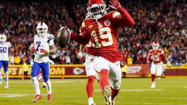 Dec 10, 2023; Kansas City, Missouri, USA; Kansas City Chiefs wide receiver Kadarius Toney (19) scores a touchdown during the second half against the Buffalo Bills at GEHA Field at Arrowhead Stadium. The play would be called back due to an offensive penalty. Mandatory Credit: Jay Biggerstaff-USA TODAY Sports