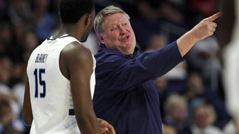 Dec 9, 2023; Norfolk, Virginia, USA; Old Dominion Monarchs head coach Jeff Jones talks to Old Dominion Monarchs guard R.J. Blakney (15) against the James Madison Dukes at Chartway Arena at the Ted Constant Convocation Center. Mandatory Credit: Peter Casey-USA TODAY Sports