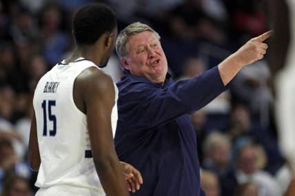 Dec 9, 2023; Norfolk, Virginia, USA; Old Dominion Monarchs head coach Jeff Jones talks to Old Dominion Monarchs guard R.J. Blakney (15) against the James Madison Dukes at Chartway Arena at the Ted Constant Convocation Center. Mandatory Credit: Peter Casey-USA TODAY Sports