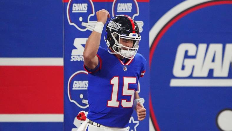 Dec 11, 2023; East Rutherford, New Jersey, USA; New York Giants quarterback Tommy DeVito (15) reacts before the game against the Green Bay Packers at MetLife Stadium. Mandatory Credit: Robert Deutsch-USA TODAY Sports