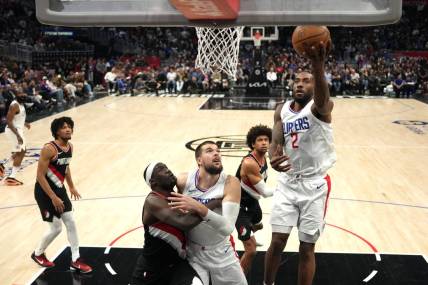 Dec 11, 2023; Los Angeles, California, USA; LA Clippers forward Kawhi Leonard (2) shoots the ball against the Portland Trail Blazers in the second half at Crypto.com Arena. Mandatory Credit: Kirby Lee-USA TODAY Sports