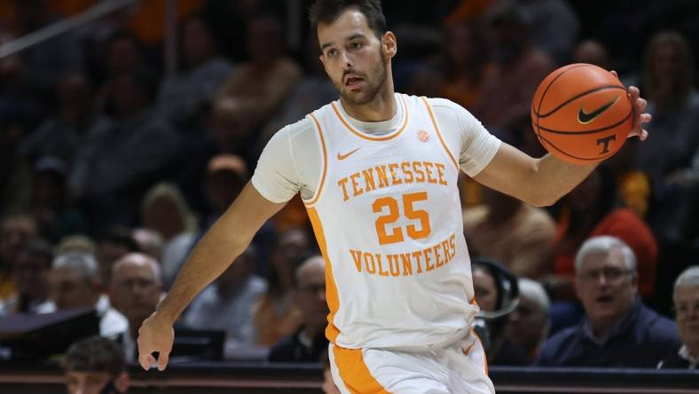 Dec 12, 2023; Knoxville, Tennessee, USA; Tennessee Volunteers guard Santiago Vescovi (25) brings the ball up court against the Georgia Southern Eagles during the first half at Food City Center at Thompson-Boling Arena. Mandatory Credit: Randy Sartin-USA TODAY Sports