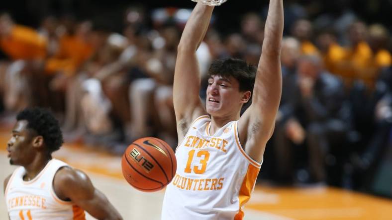 Dec 12, 2023; Knoxville, Tennessee, USA; Tennessee Volunteers forward J.P. Estrella (13) dunks the ball against the Georgia Southern Eagles at Food City Center at Thompson-Boling Arena. Mandatory Credit: Randy Sartin-USA TODAY Sports