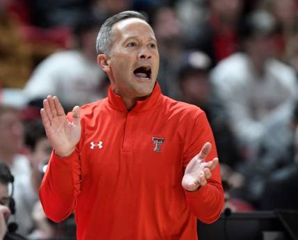 Texas Tech's head coach Grant McCasland claps his hands on the sidelines during the non-conference basketball game against Oral Roberts, Tuesday, Dec. 12, 2023, at United Supermarkets Arena.