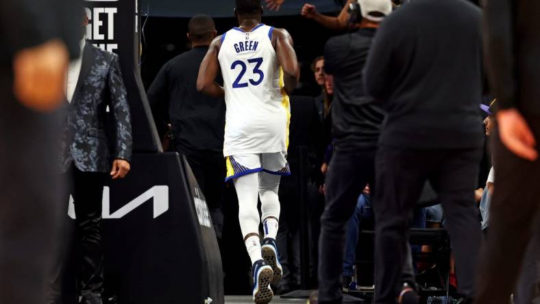 Dec 12, 2023; Phoenix, Arizona, USA; Golden State Warriors forward Draymond Green (23) runs to the locker room after being ejected for a flagrant foul two during the third quarter against the Phoenix Suns at Footprint Center. Mandatory Credit: Mark J. Rebilas-USA TODAY Sports