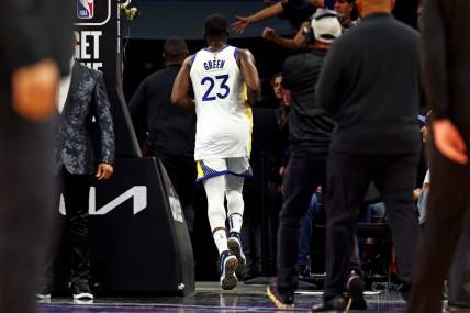 Dec 12, 2023; Phoenix, Arizona, USA; Golden State Warriors forward Draymond Green (23) runs to the locker room after being ejected for a flagrant foul two during the third quarter against the Phoenix Suns at Footprint Center. Mandatory Credit: Mark J. Rebilas-USA TODAY Sports