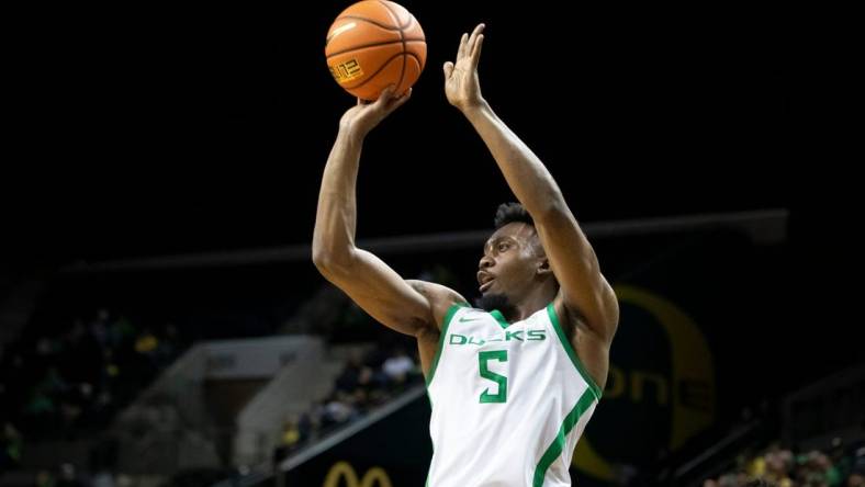 Oregon guard Jermaine Couisnard puts up a shot for three as the Oregon Ducks host California Baptist Tuesday, Dec. 12, 2023, at Matthew Knight Arena in Eugene, Ore.