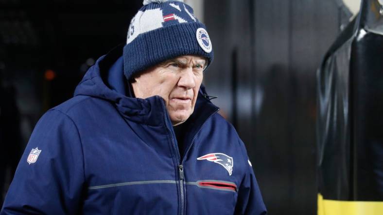 Dec 7, 2023; Pittsburgh, Pennsylvania, USA;  New England Patriots head coach Bill Belichick walks to the field before the game against the Pittsburgh Steelers at Acrisure Stadium. Mandatory Credit: Charles LeClaire-USA TODAY Sports