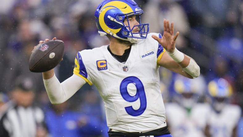 Dec 10, 2023; Baltimore, Maryland, USA;  Los Angeles Rams quarterback Matthew Stafford (9) passses against the Baltimore Ravens during the second half at M&T Bank Stadium. Mandatory Credit: Jessica Rapfogel-USA TODAY Sports