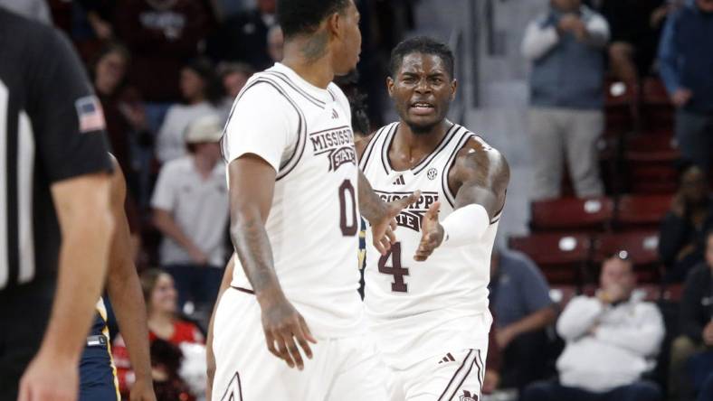 Dec 13, 2023; Starkville, Mississippi, USA; Mississippi State Bulldogs forward Cameron Matthews (4) reacts with Mississippi State Bulldogs forward D.J. Jeffries (0) during the second half against the Murray State Racers at Humphrey Coliseum. Mandatory Credit: Petre Thomas-USA TODAY Sports