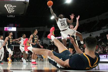 Dec 13, 2023; Starkville, Mississippi, USA; Mississippi State Bulldogs guard Dashawn Davis (10) drives to the basket during the second half against the Murray State Racers at Humphrey Coliseum. Mandatory Credit: Petre Thomas-USA TODAY Sports