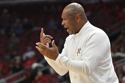 Dec 13, 2023; Louisville, Kentucky, USA; Louisville Cardinals head coach Kenny Payne shouts instructions during the first half against the Arkansas State Red Wolves at KFC Yum! Center. Arkansas State defeated Louisville 75-63. Mandatory Credit: Jamie Rhodes-USA TODAY Sports