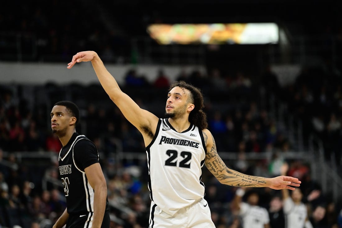 Dec 10, 2023; Providence, Rhode Island, USA;  Providence Friars guard Devin Carter (22) shoots for a three point basket during the first half against the Brown Bears at Amica Mutual Pavilion. Mandatory Credit: Eric Canha-USA TODAY Sports