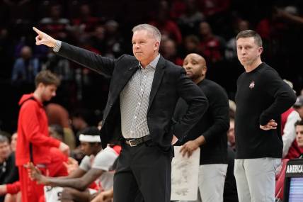Dec 6, 2023; Columbus, OH, USA; Ohio State Buckeyes head coach Chris Holtmann motions during the first half of the NCAA men   s basketball game against the Miami Redhawks at Value City Arena.