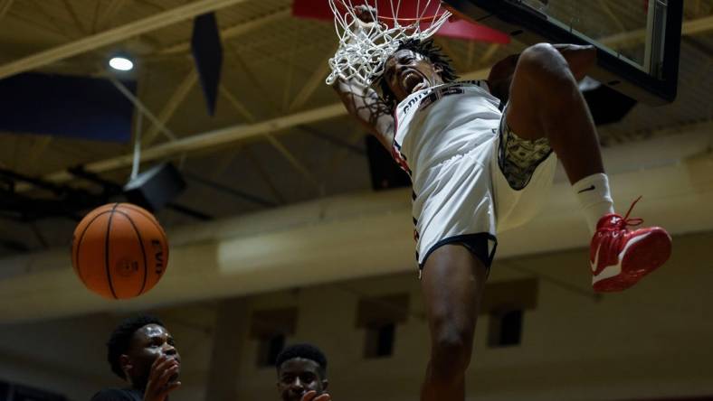 Grovetown shooting guard Derrion Reid (35) dunks the ball during the Grovetown and Brunswick Region 2 AAAAAA championship game at Grovetown High School on Saturday, Feb. 18, 2023. Grovetown defeated Brunswick 89-55.