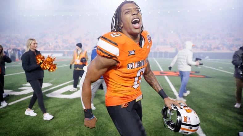 Oct 28, 2023; Stillwater, Oklahoma, USA; Oklahoma State Cowboys running back Ollie Gordon II (0) celebrates after a college football game between Oklahoma State and Cincinnati at Boone Pickens Stadium. Oklahoma State won 45-13.