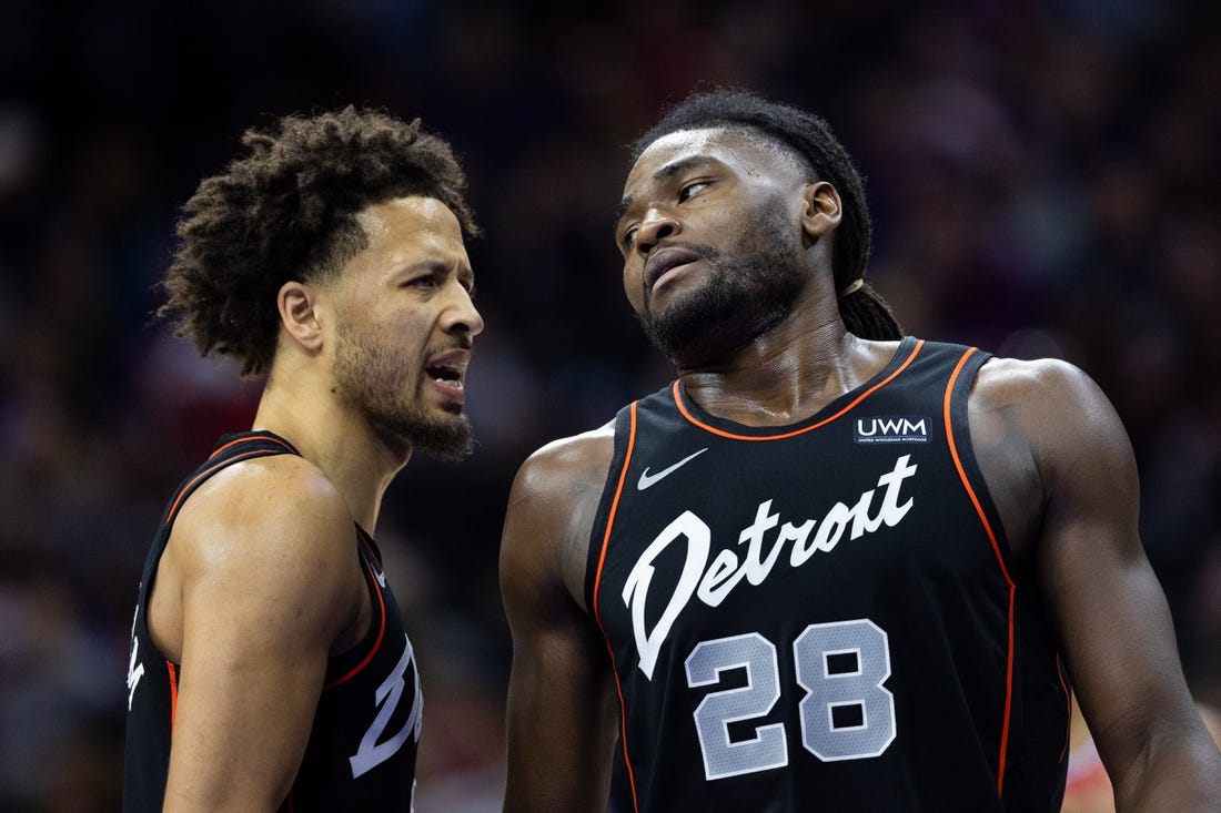 Dec 15, 2023; Philadelphia, Pennsylvania, USA; Detroit Pistons center Isaiah Stewart (28) reacts with guard Cade Cunningham (2) after a Philadelphia 76ers score during the second quarter at Wells Fargo Center. Mandatory Credit: Bill Streicher-USA TODAY Sports