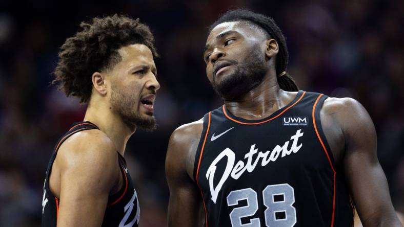 Dec 15, 2023; Philadelphia, Pennsylvania, USA; Detroit Pistons center Isaiah Stewart (28) reacts with guard Cade Cunningham (2) after a Philadelphia 76ers score during the second quarter at Wells Fargo Center. Mandatory Credit: Bill Streicher-USA TODAY Sports