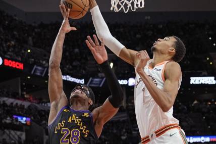 Dec 15, 2023; San Antonio, Texas, USA; San Antonio Spurs forward Victor Wembanyama (1) blocks the shot attempt by Los Angeles Lakers forward Rui Hachimura (28) during the second half at Frost Bank Center. Mandatory Credit: Scott Wachter-USA TODAY Sports