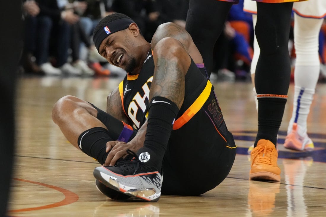 Dec 15, 2023; Phoenix, Arizona, USA; Phoenix Suns guard Bradley Beal (3) reacts after getting hurt against the New York Knicks in the first half at Footprint Center. Mandatory Credit: Rick Scuteri-USA TODAY Sports