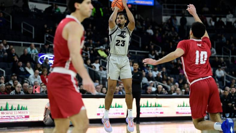 Dec 16, 2023; Providence, Rhode Island, USA; Providence Friars forward Bryce Hopkins (23) shoots the ball against the Sacred Heart Pioneers during the first half at Amica Mutual Pavilion. Mandatory Credit: Eric Canha-USA TODAY Sports