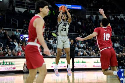 Dec 16, 2023; Providence, Rhode Island, USA; Providence Friars forward Bryce Hopkins (23) shoots the ball against the Sacred Heart Pioneers during the first half at Amica Mutual Pavilion. Mandatory Credit: Eric Canha-USA TODAY Sports