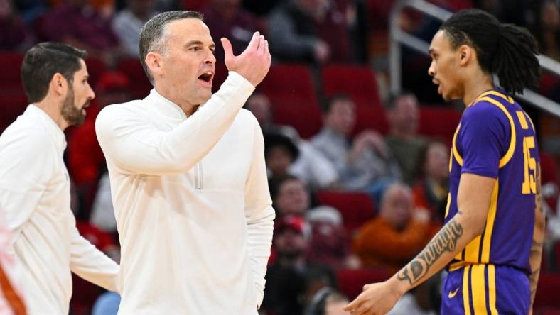 Dec 16, 2023; Houston, Texas, USA; LSU Tigers head coach Matt McMahon gestures to players against the Texas Longhorns during the second half at Toyota Center. Mandatory Credit: Maria Lysaker-USA TODAY Sports