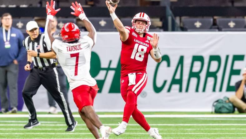 Cajuns quarterback Chandler Fields 18 throws a pass as Louisiana   s Ragin Cajuns take on the Jaksonville State Gacmecocks in the R&L Carriers New Orleans Bowl in the Caesars Superdome. New Orleans, La. Saturday, Dec. 16, 2023.