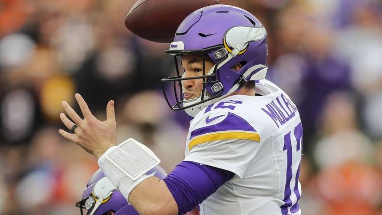 Dec 16, 2023; Cincinnati, Ohio, USA; Minnesota Vikings quarterback Nick Mullens (12) throws a pass against the Cincinnati Bengals in the first half at Paycor Stadium. Mandatory Credit: Katie Stratman-USA TODAY Sports