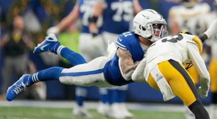 Indianapolis Colts wide receiver Michael Pittman Jr. (11) collides with Pittsburgh Steelers safety Damontae Kazee (23) on Saturday, Dec. 16, 2023, during a game against the Pittsburgh Steelers at Lucas Oil Stadium in Indianapolis. Pittman Jr. left the field after the play.