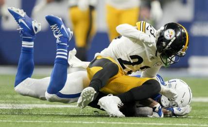 Dec 16, 2023; Indianapolis, Indiana, USA; Indianapolis Colts wide receiver Michael Pittman Jr. (11) collides with Pittsburgh Steelers safety Damontae Kazee (23) during a game against the Pittsburgh Steelers at Lucas Oil Stadium. Mandatory Credit: Robert Scheer-USA TODAY Sports