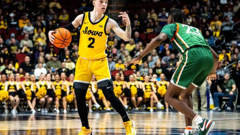 Iowa's Brock Harding directs the offense during the Hawkeye Showcase at Wells Fargo Arena on Saturday, Dec. 16, 2023, in Des Moines.