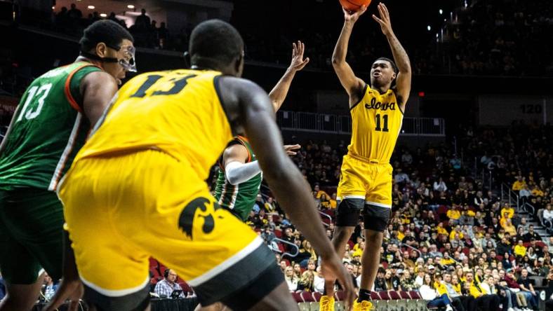 Iowa's Tony Perkins attempts a shot during the Hawkeye Showcase at Wells Fargo Arena on Saturday, Dec. 16, 2023, in Des Moines.