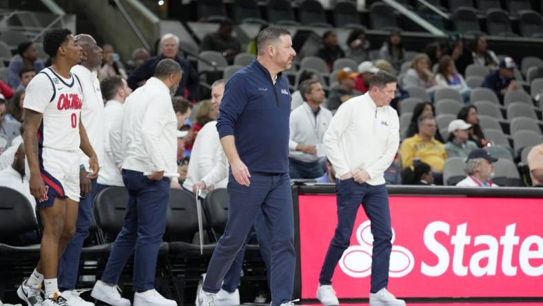 Dec 16, 2023; San Antonio, Texas, USA; Mississippi Rebels head coach Chris Beard looks on during the first half against the California Golden Bears at the Frost Bank Center. Mandatory Credit: Daniel Dunn-USA TODAY Sports