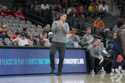 Dec 16, 2023; San Antonio, Texas, USA;  California Golden Bears head coach Mark Madsen looks on in the first half against the Mississippi Rebels at the Frost Bank Center. Mandatory Credit: Daniel Dunn-USA TODAY Sports