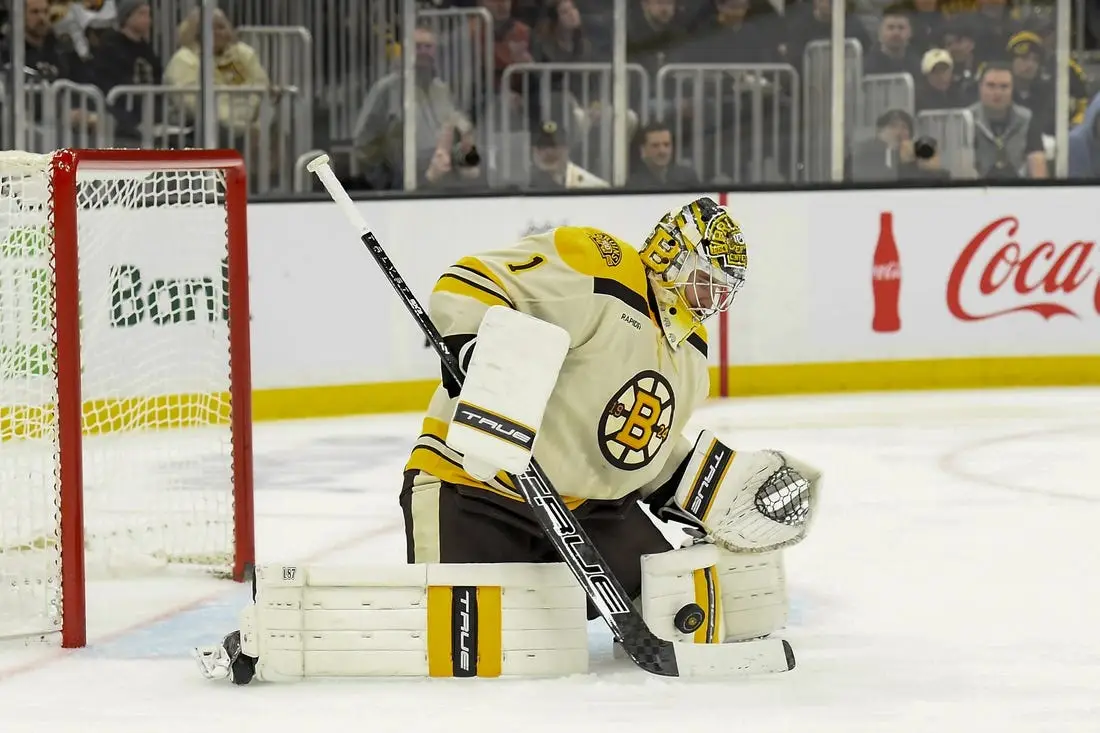 Dec 16, 2023; Boston, Massachusetts, USA;  Boston Bruins goaltender Jeremy Swayman (1) makes a save during the second period against the New York Rangers at TD Garden. Mandatory Credit: Bob DeChiara-USA TODAY Sports