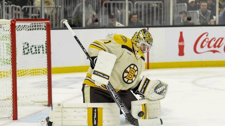 Dec 16, 2023; Boston, Massachusetts, USA;  Boston Bruins goaltender Jeremy Swayman (1) makes a save during the second period against the New York Rangers at TD Garden. Mandatory Credit: Bob DeChiara-USA TODAY Sports