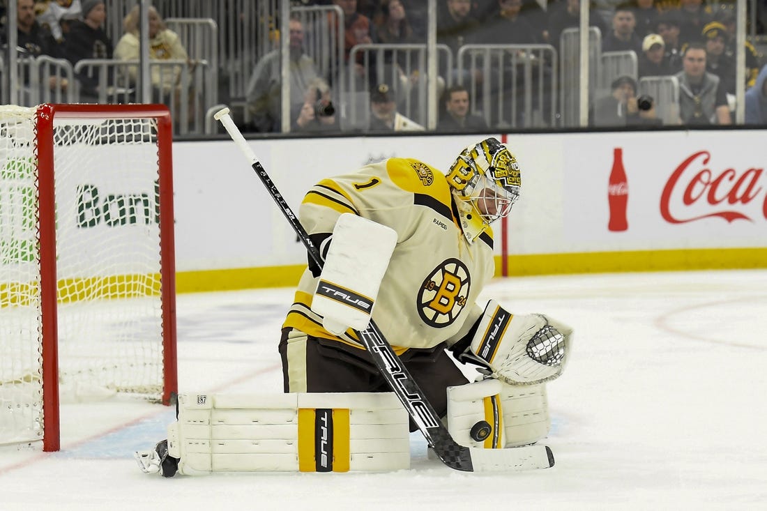 Dec 16, 2023; Boston, Massachusetts, USA;  Boston Bruins goaltender Jeremy Swayman (1) makes a save during the second period against the New York Rangers at TD Garden. Mandatory Credit: Bob DeChiara-USA TODAY Sports