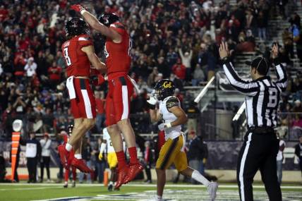 Dec 16, 2023; Shreveport, LA, USA; Texas Tech Red Raiders wide receiver Coy Eakin (8) reacts with tight end Mason Tharp (80) after a touchdown catch during the first half against the California Golden Bears at Independence Stadium. Mandatory Credit: Petre Thomas-USA TODAY Sports