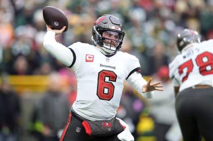 Dec 17, 2023; Green Bay, Wisconsin, USA;  Tampa Bay Buccaneers quarterback Baker Mayfield (6) throws a pass during the first quarter against the Green Bay Packers at Lambeau Field. Mandatory Credit: Jeff Hanisch-USA TODAY Sports
