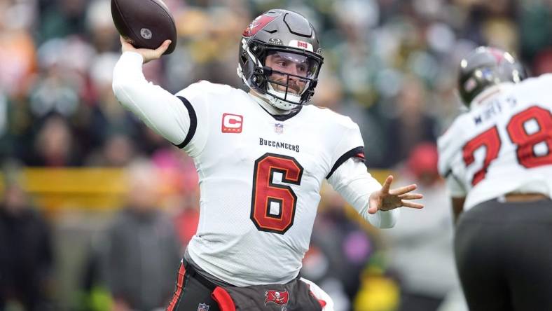 Dec 17, 2023; Green Bay, Wisconsin, USA;  Tampa Bay Buccaneers quarterback Baker Mayfield (6) throws a pass during the first quarter against the Green Bay Packers at Lambeau Field. Mandatory Credit: Jeff Hanisch-USA TODAY Sports