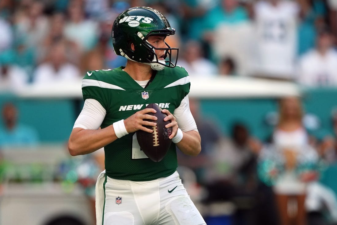 Dec 17, 2023; Miami Gardens, Florida, USA; New York Jets quarterback Zach Wilson (2) drops back to attempt a pass against the Miami Dolphins during the first half at Hard Rock Stadium. Mandatory Credit: Jasen Vinlove-USA TODAY Sports