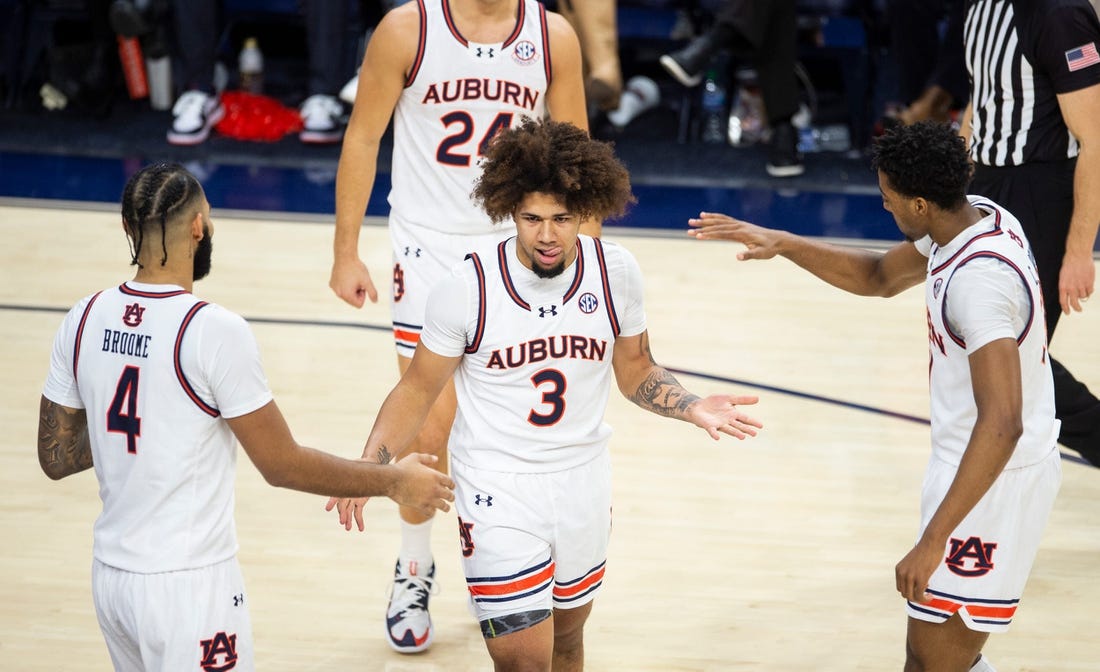 Auburn Tigers guard Tre Donaldson (3) reacts after drawing a foul as Auburn Tigers take on USC Trojans at Neville Arena in Auburn, Ala., on Sunday, Dec. 17, 2023. Auburn Tigers defeated USC Trojans 91-75.