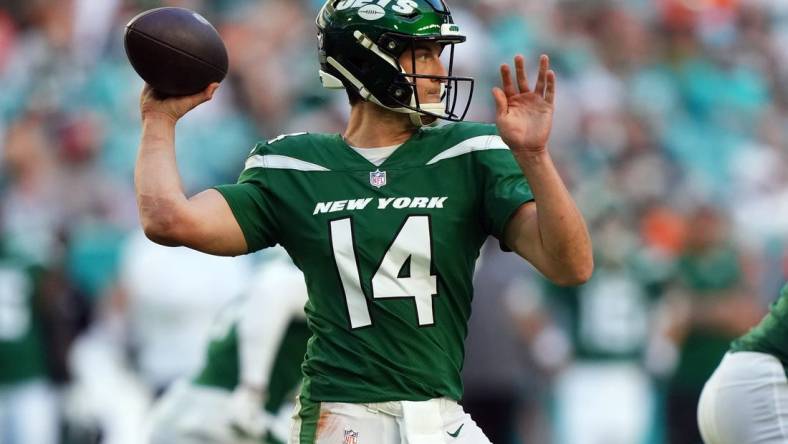 Dec 17, 2023; Miami Gardens, Florida, USA; New York Jets quarterback Trevor Siemian (14) attempts a pass against the Miami Dolphins during the second half at Hard Rock Stadium. Mandatory Credit: Jasen Vinlove-USA TODAY Sports