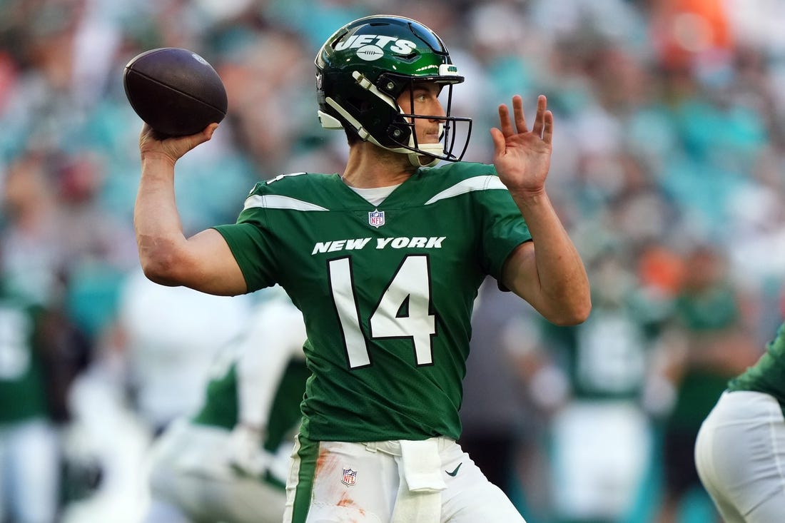 Dec 17, 2023; Miami Gardens, Florida, USA; New York Jets quarterback Trevor Siemian (14) attempts a pass against the Miami Dolphins during the second half at Hard Rock Stadium. Mandatory Credit: Jasen Vinlove-USA TODAY Sports