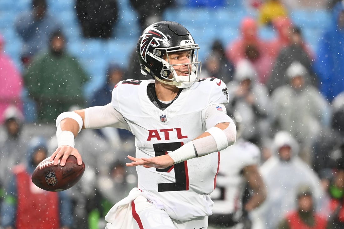 Dec 17, 2023; Charlotte, North Carolina, USA;  Atlanta Falcons quarterback Desmond Ridder (9) looks to pass in the third quarter at Bank of America Stadium. Mandatory Credit: Bob Donnan-USA TODAY Sports