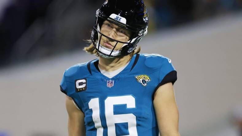 Jacksonville Jaguars quarterback Trevor Lawrence (16) looks on during the third quarter of a regular season NFL football matchup Sunday, Dec. 17, 2023 at EverBank Stadium in Jacksonville.